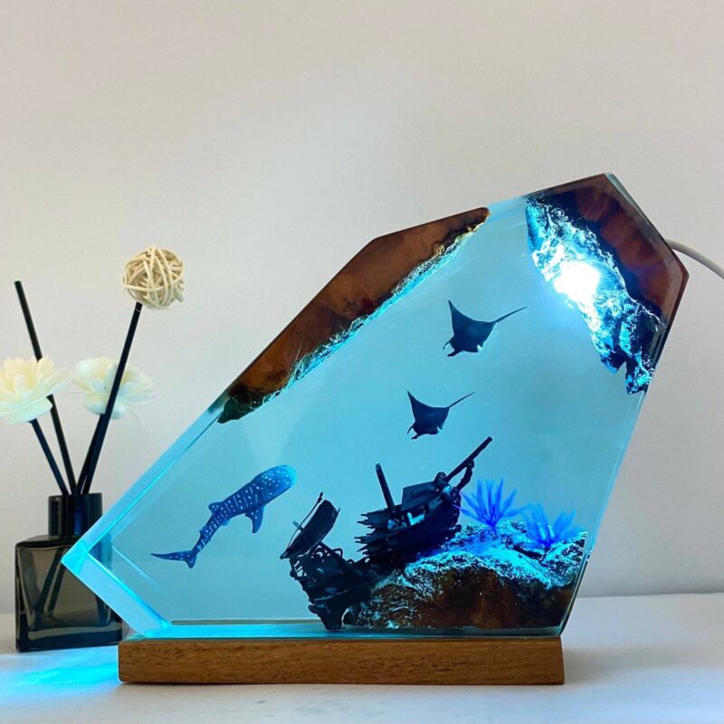 Whale Shark Resin Night Light by xaudis illuminating a cozy room