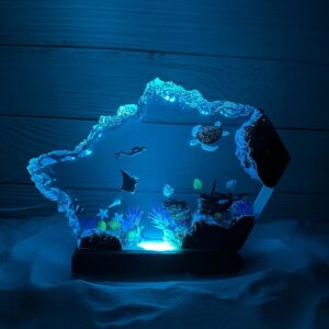 Resin night light featuring a turtle and scuba diver, enchanting decor