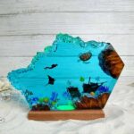 Resin night light featuring Ray the turtle and scuba diver, enchanting decor