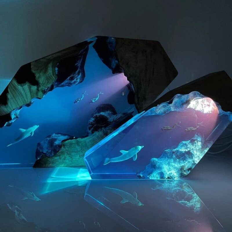 Dolphin night light illuminating a serene ocean miniature by xaudis
