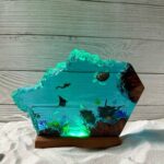Resin night light featuring a turtle and scuba diver design by xaudis, enchanting home decor.