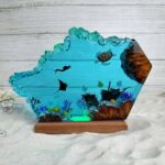 Resin night light featuring a turtle and scuba diver by xaudis, enchanting decor for kids' rooms