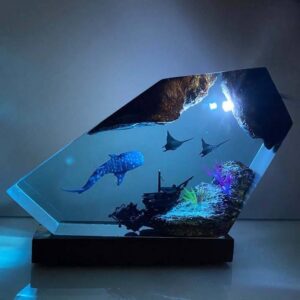 Whale Shark Resin Night Light by xaudis illuminating a cozy room